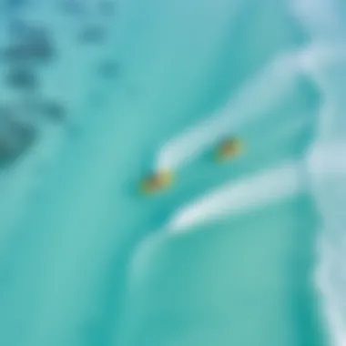 An aerial view of kitesurfers enjoying the Maldives' beautiful coastline