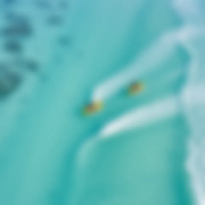 An aerial view of kitesurfers enjoying the Maldives' beautiful coastline