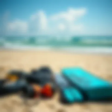 Essential Gear for Every Kiteboarder Essential kiteboarding gear laid out on the beach