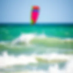 A colorful kite soaring high above the ocean waves