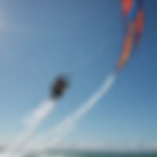 A stunning Cabrinha kite soaring through a clear blue sky