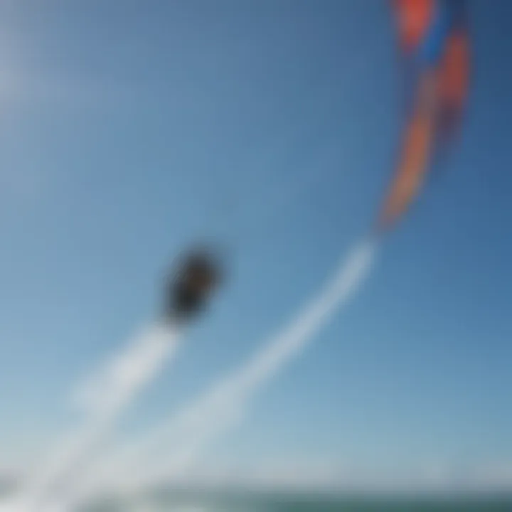 A stunning Cabrinha kite soaring through a clear blue sky