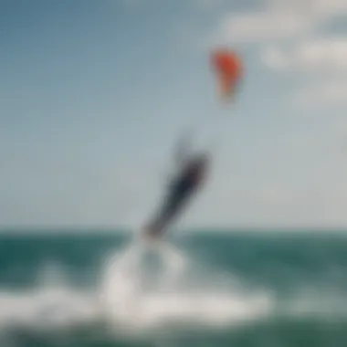 A kiteboarder showcasing advanced techniques with a Cabrinha kite