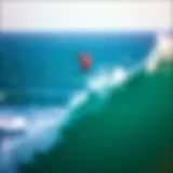 Vibrant Kite Above Ocean A vibrant kite soaring high above the ocean waves