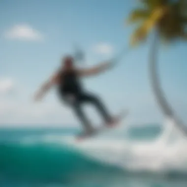 Kiteboarder performing a jump against a backdrop of turquoise waters