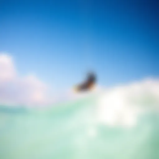 Kiteboarder soaring above turquoise waters