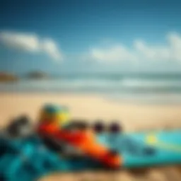 Essential kiteboarding gear laid out on a beach