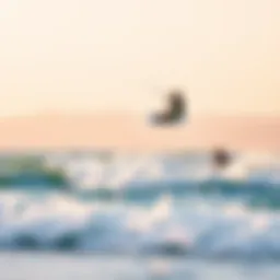 A breathtaking view of kiteboarders riding the waves at a popular California beach