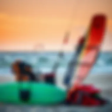 Kitesurfing Gear Setup A colorful kitesurfing setup on a beach at sunset