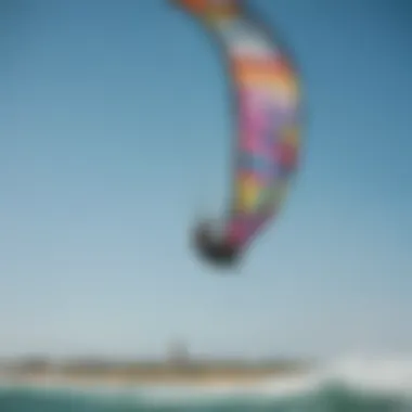 A vibrant kiteboarding scene showcasing colorful kites against the blue sky