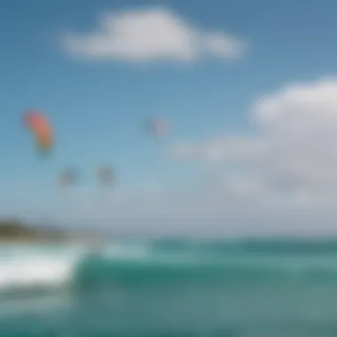 Vibrant kiteboarding scene in Aruba with multiple kites in the sky