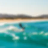 Kiteboarding Adventure on a Clear Day Kiteboarding at a sunny beach with clear skies