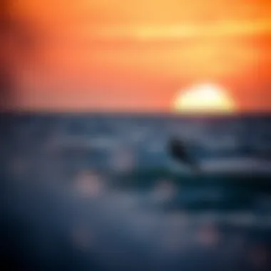 A stunning sunset over the ocean with a kitesurfing silhouette