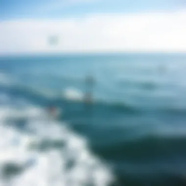 Aerial View of Kiteboarders Aerial view of kiteboarders navigating the waves