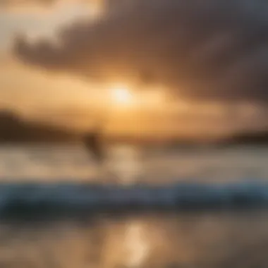 A breathtaking sunset over Coco Bay with kiteboarders silhouetted against the skyline