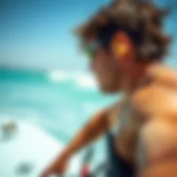 Kiteboarder wearing Surfears ear plugs in action
