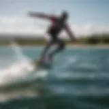 A dynamic foil kiteboarding scene showcasing a rider gliding above the water