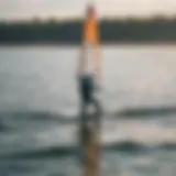 A kite foiler gliding effortlessly over the water surface