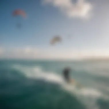 An aerial view of kiteboarders maneuvering in sync against a vibrant ocean backdrop