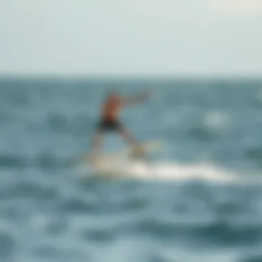 Hydrofoil Surfing in Action An athlete demonstrating hydrofoil surfing on calm waters
