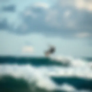 Kiteboarding Adventure A kiteboarder soaring over waves