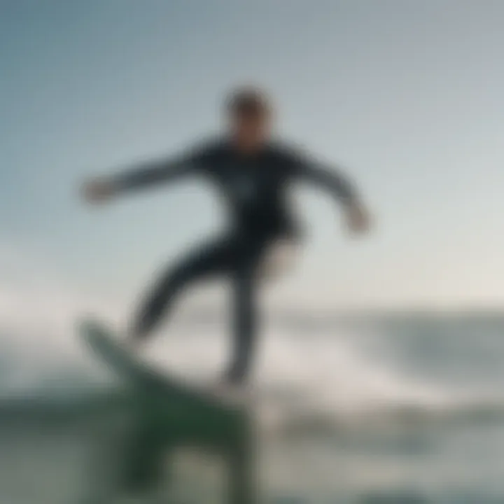 Kiteboarder maneuvering on water while wearing a Mystic wetsuit