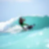 Kiteboarder in Action on Barbados Waves Stunning kiteboarder carving through the waves of Barbados