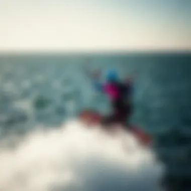 An aerial view of kiteboarding on a vast ocean with big kites