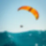 A Stunning Travel Kite in Action Vibrant travel kite soaring against a clear blue sky