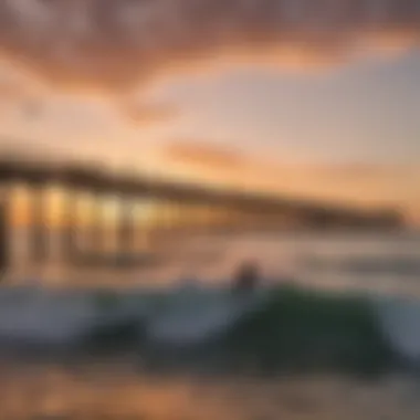 A breathtaking view of Venice Beach Pier at sunset with kiteboarders in action