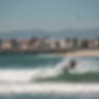 Wide shot of the vibrant Venice Beach scene, showcasing both the pier and kiteboarding activities