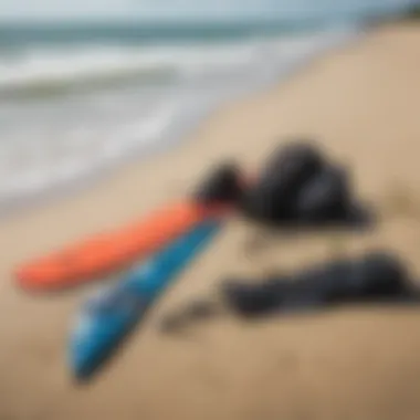 Kiteboarding equipment laid out on the sandy beach of Zeeland