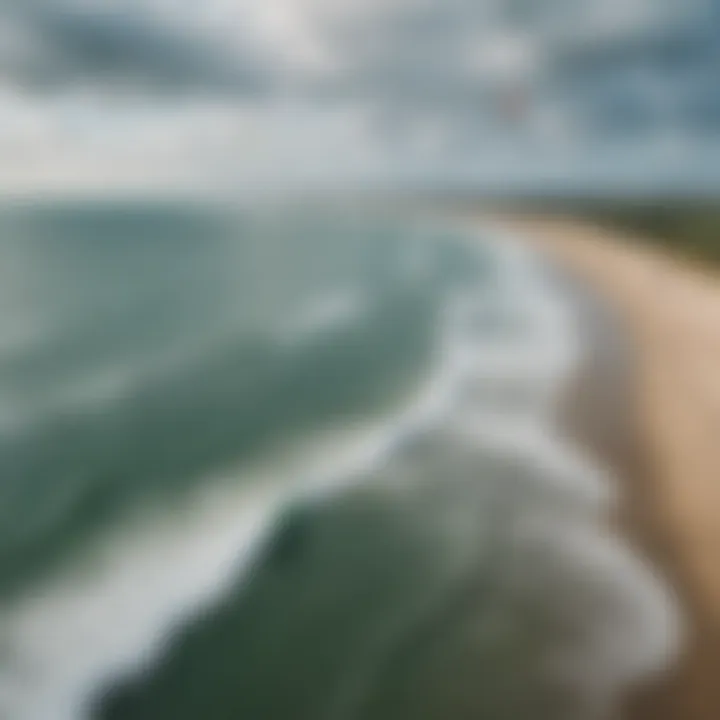 A panoramic view of Zeeland's coastline with kiteboarders in action