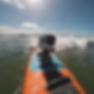 Close-up of a GoPro camera mounted on a kiteboard.