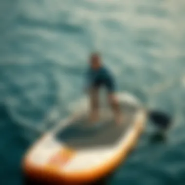 Stability in Action: Hydro Force Paddle Board on Water User demonstrating the stability of the Hydro Force inflatable paddle board on water