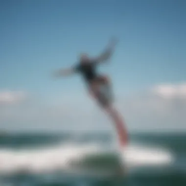 Kiteboarder Gliding with Hydrofoil Dynamic shot of a kiteboarder gliding above water with hydrofoil