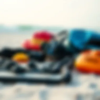 Essential Gear for Kiteboarding Close-up of essential kiteboarding gear laid out on the beach