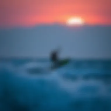 Kiteboarding at Dusk A stunning sunset at a kiteboarding location