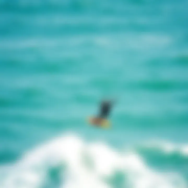 A breathtaking view of a kite foiler gliding over the water