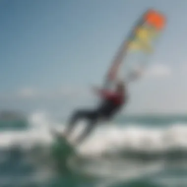 Kite surfer gliding over the waves