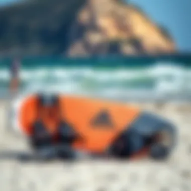 Equipment setup for kite surfing including harness, board, and kite on the beach