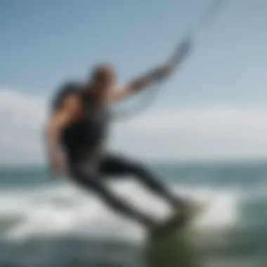 Kiteboarder using a bungee waist leash during a dynamic ride on the water