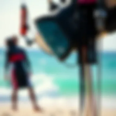A close-up of kiteboarding equipment set against the backdrop of the beach
