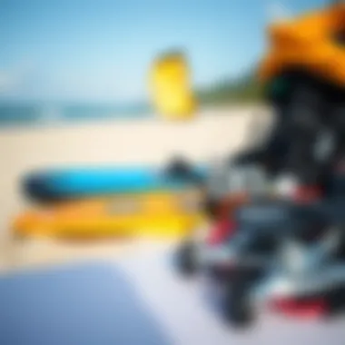 Essential Kiteboarding Gear on the Beach A close-up of kiteboarding gear laid out on a sandy beach, showcasing essential equipment for the sport.
