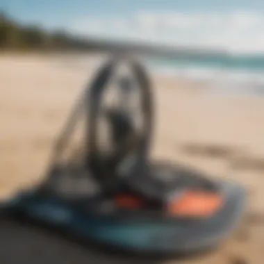 Essential kiteboarding gear displayed on the beach.