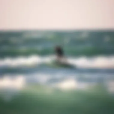 Kiteboarder using hover surf technology on the waves