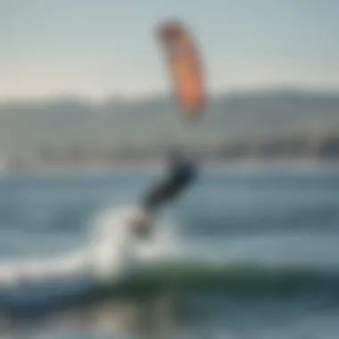 Kiteboarders gliding over the crystal-clear waters of Bodega Bay, capturing the thrill of the sport.