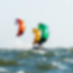 Colorful kiteboarding kites in action over water