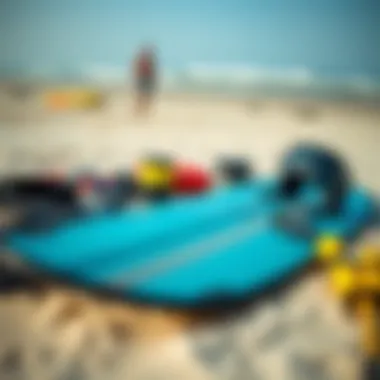 Essential kiteboarding gear laid out on the beach