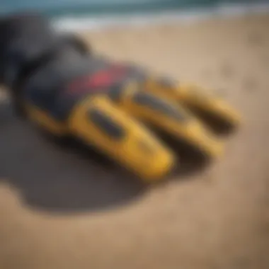 Detailed Look at Kitesurf Gloves Close-up view of kitesurf gloves on a textured surface